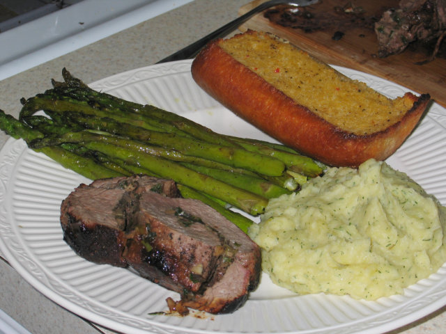 Birthday Dinner.  Asparagus, dill mashed potatoes, filet pinwheel, garlic bread.