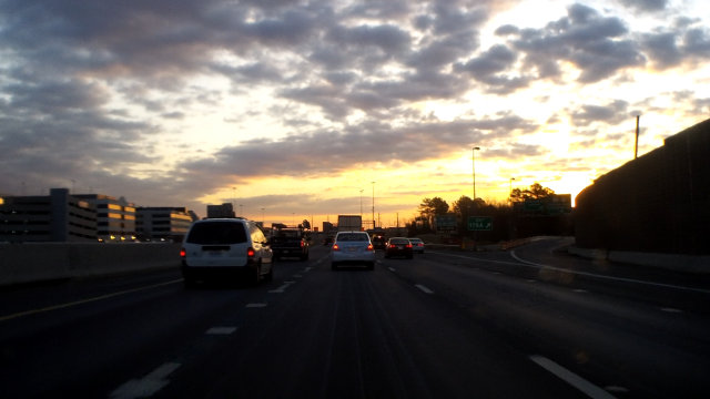 Sunrise as seen from a car, driving on the I-495 DC Beltway.