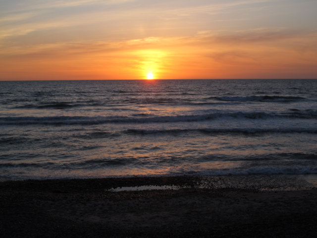 An ocean based sunset off the short of San Diego.