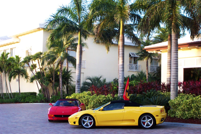 Yellow and red Ferraris parked outside of a hotel in Florida.