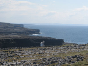 Waves, cliffs, at Dun Aengus.